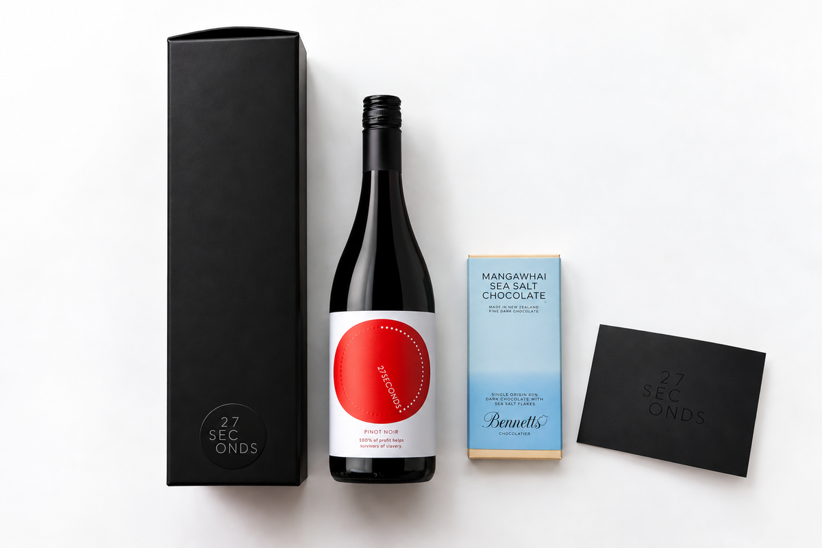 Wine and chocolate gift box featuring a bottle of 27seconds Pinot Noir, a block of chocolate and a personalised gift card.