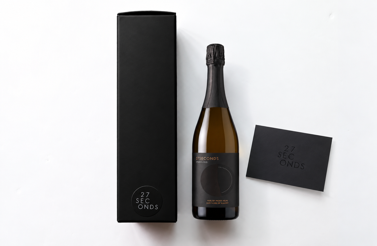 Single bottle wine gift in a black gift box with 27seconds logo sticker and complimentary gift card